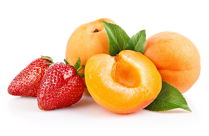 red strawberries and round orange fruits, apricot, strawberry