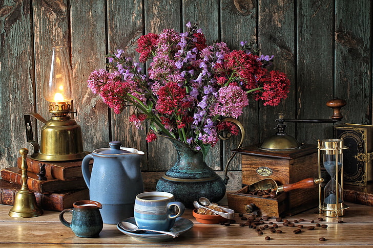 purple and red petaled flowers, books, lamp, coffee, bouquet