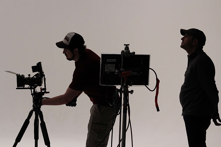 film crew on set in studio, camera - photographic equipment