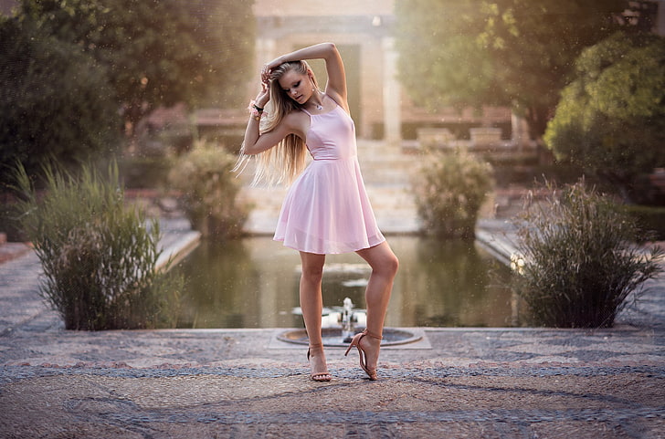 women's pink sleeveless dress, park, garden, legs, arms up, women outdoors