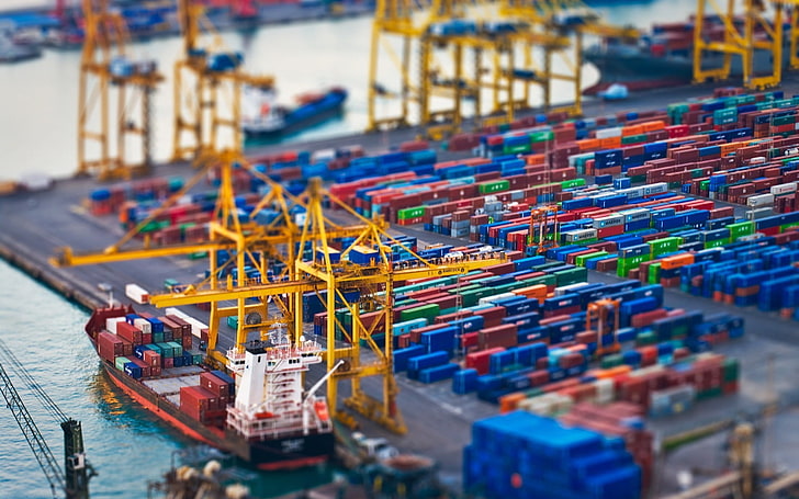 yellow crane scale model, areal photography of ship, tilt shift