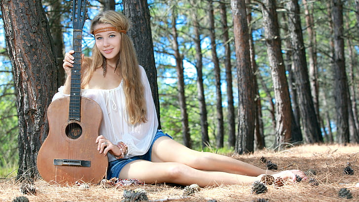 Long hair girl in forest, guitar, music