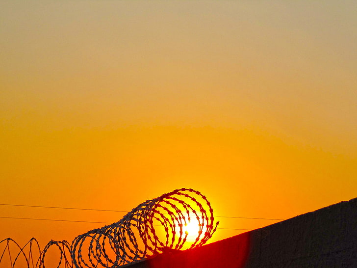 Sun, sunlight, silhouette, wall, barbed wire, sunset, orange color