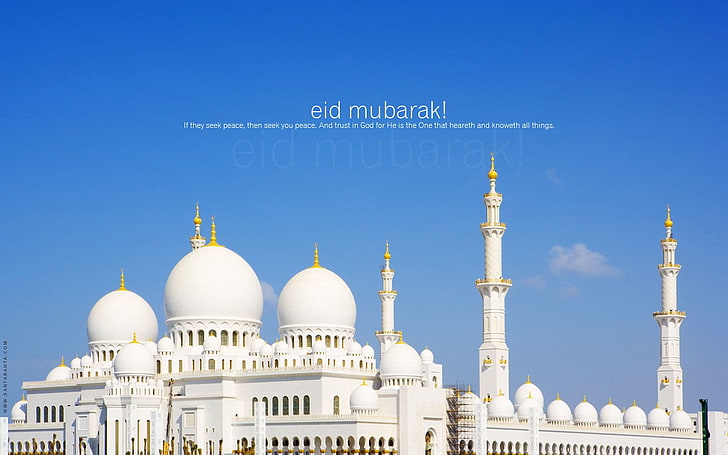 Eid Mubarak Mosque, white concrete building with text overlay