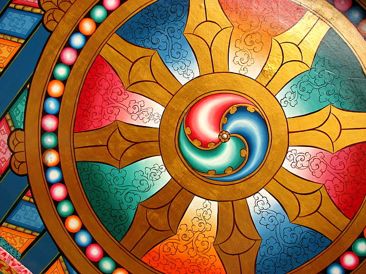 multicolored floral stein glass decor, dharma, wheel, chakra