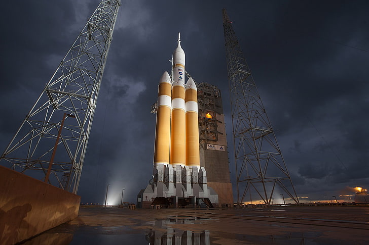 white and orange rocket, landscape, clouds, storm, NASA, spaceship
