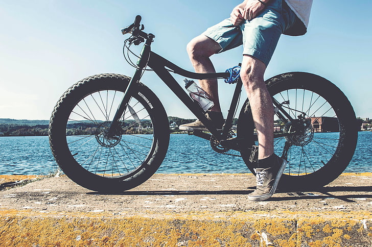 black fat bike, cyclist, legs, bicycle, river, cycling, sport