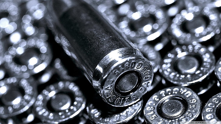 ammunition, metal, close-up, no people, indoors, focus on foreground