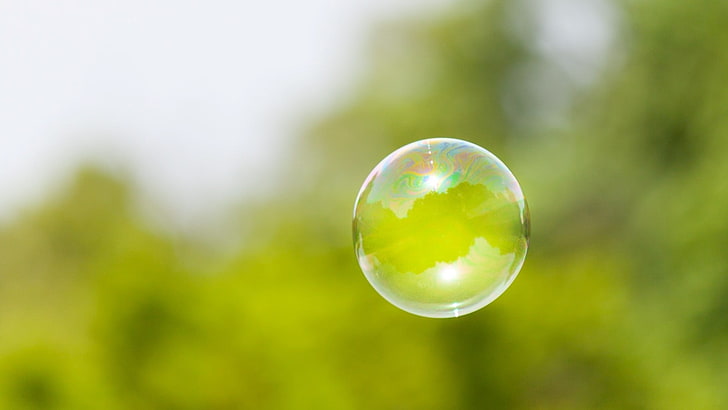 focused photo of bubble, bubbles, floating, blurred, sphere, green color