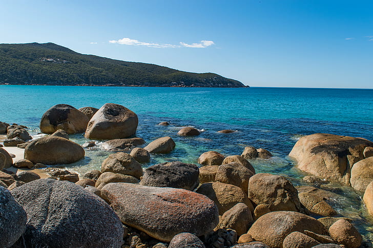 panoramic photo of stones in blue ocean under the blue sky during day time, HD wallpaper