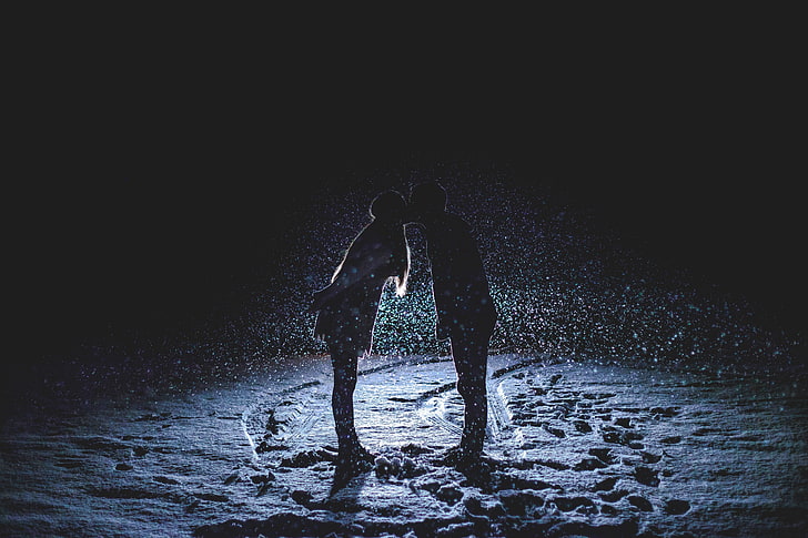 silhouette photo of woman and man kissing, love, snow, full length