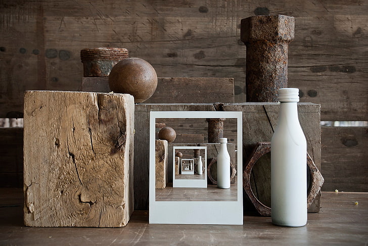 white bottle near brown boxes, wood, wooden surface, pattern