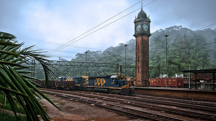 old train station, railway, diesel locomotive, tower, clocks