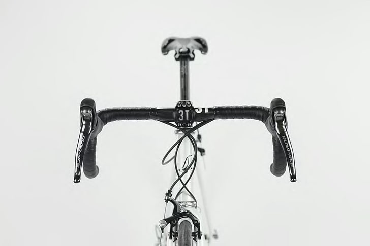 black and white road bike, bicycle, carbon fiber , studio shot