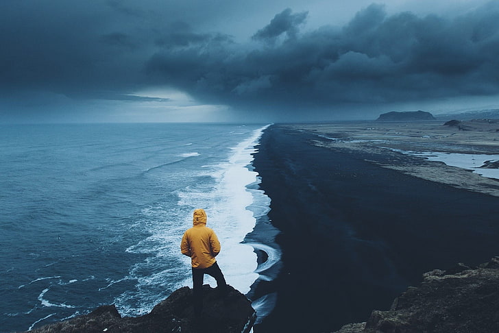 yellow hoodie, sea, coast, water, sky, one person, cloud - sky