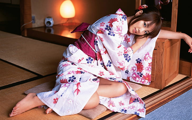 The indoor beautiful Japanese kimono girl