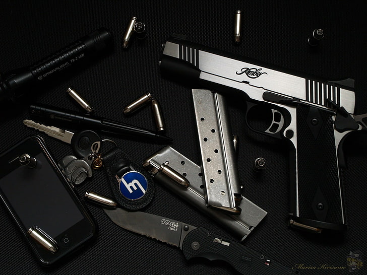 black and gray semi-automatic pistol, knife, gun, keys, ammunition