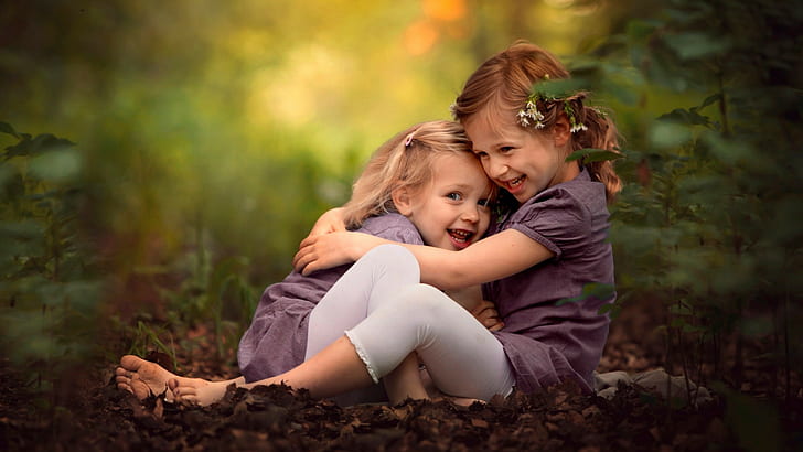 HD wallpaper: little girl children hugging smiling depth of field,  childhood | Wallpaper Flare