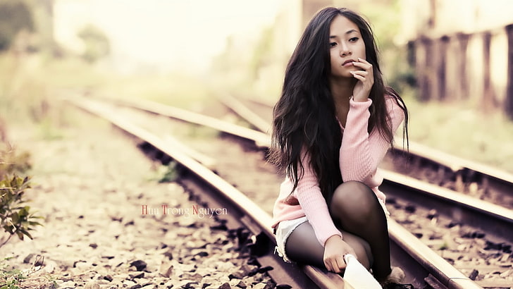 women's pink sweater, untitled, Asian, brunette, railway, model