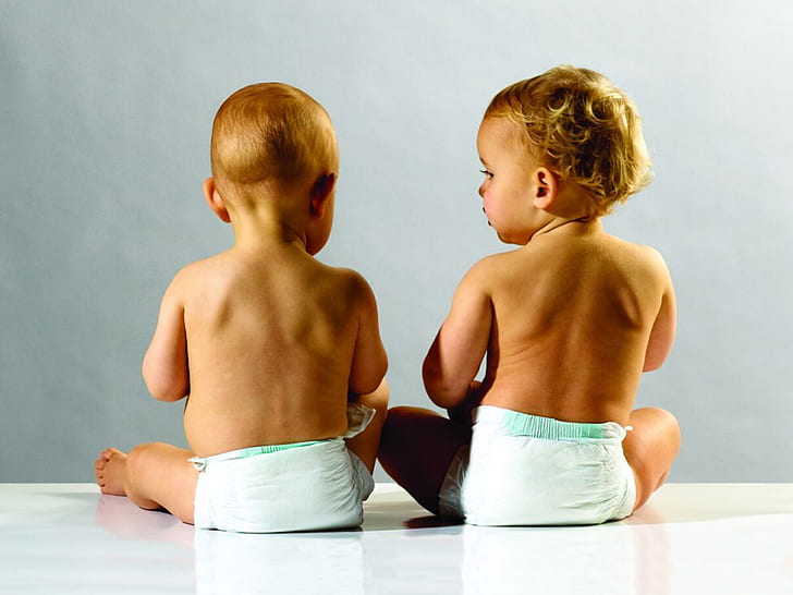Cute babies Playing HD, two white and green disposable diapers