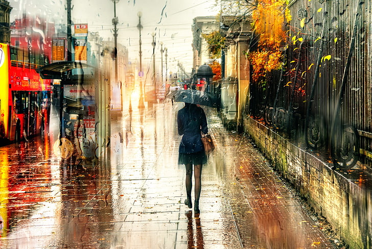 woman standing beside road painting, St. Petersburg, Russia, rain
