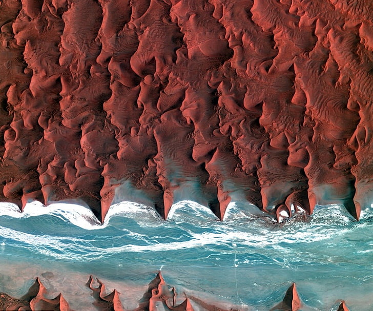 ocean waves on seashore during daytime, Namibia, desert, coast