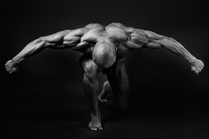 Bodybuilder doing a Back Double Biceps pose-demhanvico.com.vn