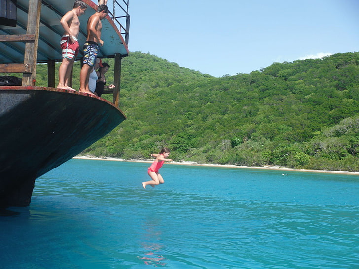 jumping off the willy t in the bvi, water, real people, lifestyles.