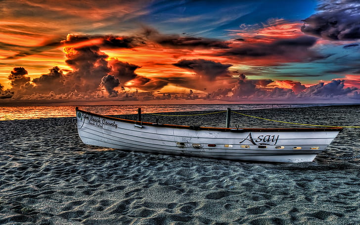 Sunset sea beach landscape, cloudy sky, boat