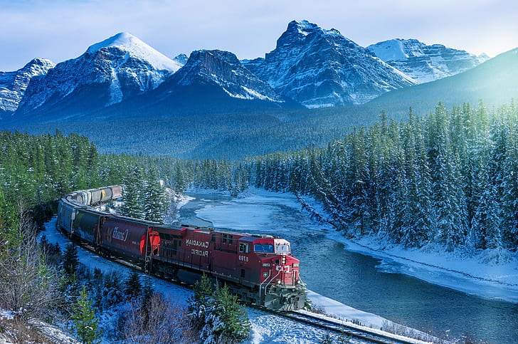train canada landscape mountain trees snow snowy peak forest railway river ice rocky mountains