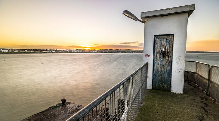 photography of white shed near sea during daytime, skerries, dublin, ireland, skerries, dublin, ireland