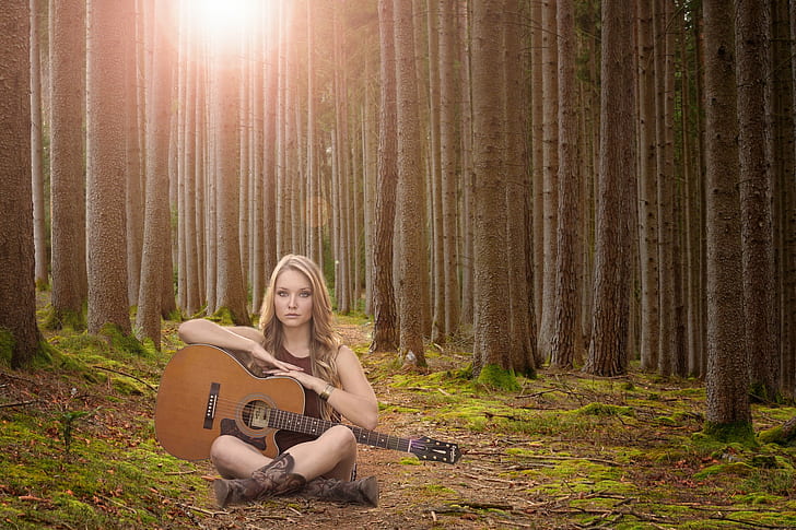 woman holding brown classical guitar sitting in the middle of the forest, HD wallpaper