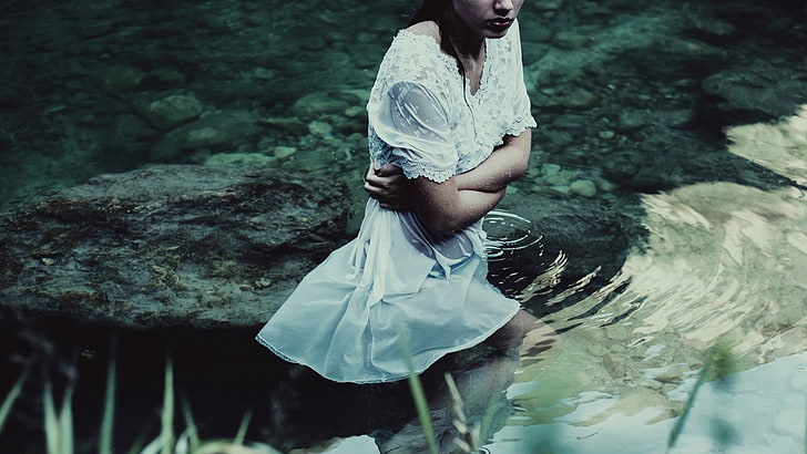 women, white dress, wet, water, arms crossed, ripples, arms on chest