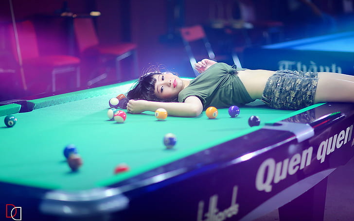 Billiards table and girl