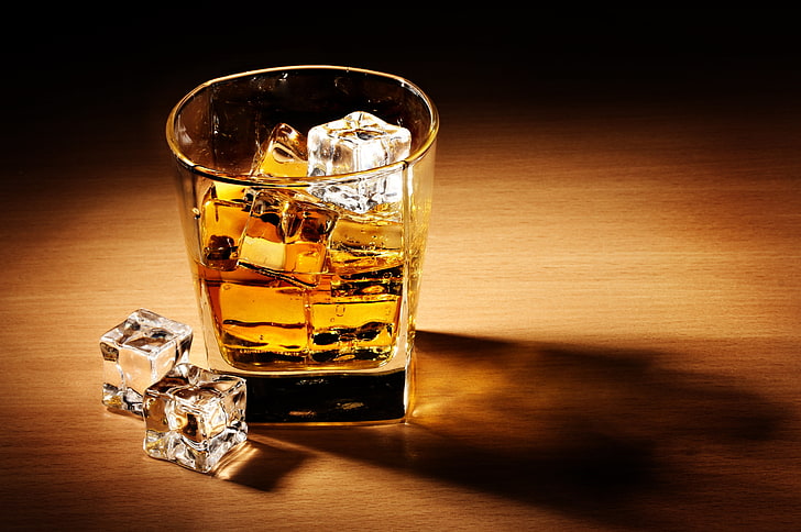 clear drinking glass, ice, table, cubes, shadow, alcohol, whiskey