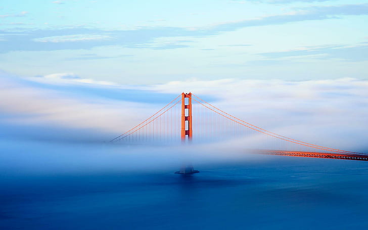 Golden Gate Bridge covered in fog, golden gate bridge san francisco california