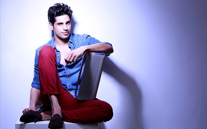 Handsome Siddharth Malhotra, men's blue collared button-up shirt and red pants