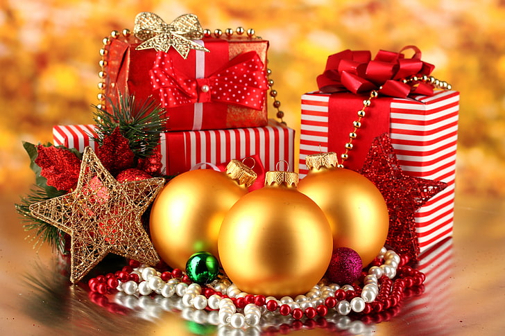 three gold-colored baubles, stars, decoration, tape, gifts, Merry Christmas