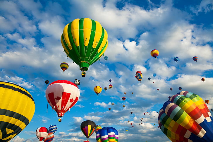 assorted hot air balloons under gray clouds during daytime, hot  air  balloon