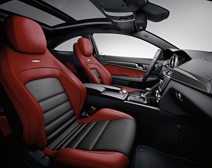 2012 Mercedes Benz C63 AMG Car Interior, two red-and-black leather vehicle bucket seats