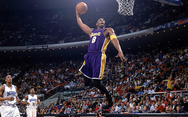 Download Kobe Bryant flying through the air with fierce determination  Wallpaper  Wallpaperscom