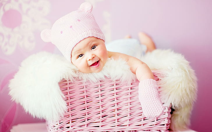 Cute Laughing Baby, pink wicker basket