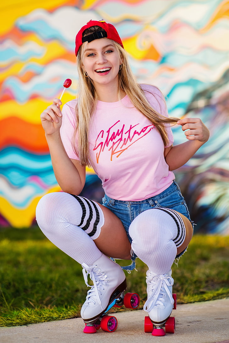 women's pink crew-neck t-shirt, model, blonde, squatting, long hair