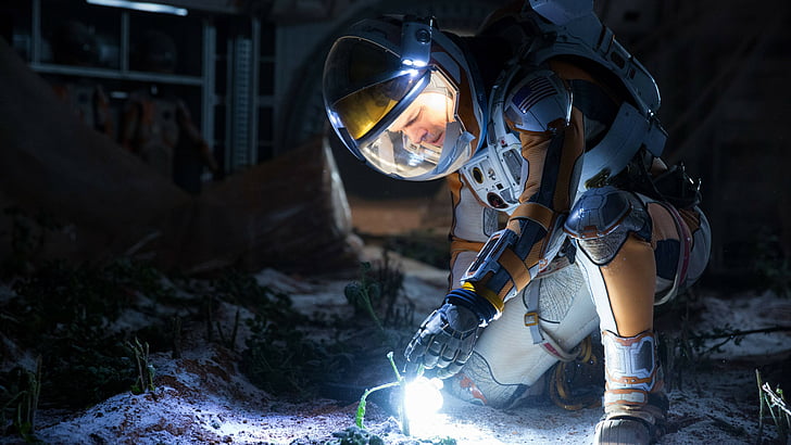 astronaut man holding bulb exploring another world, The Martian