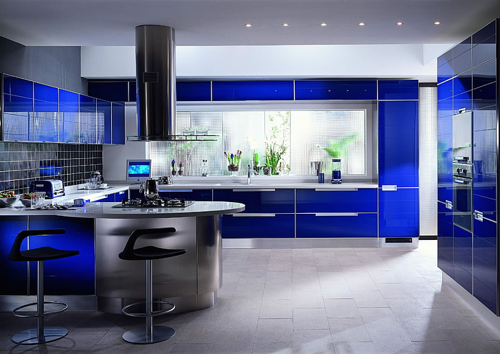 blue glass cabinet, gray and blue kitchen area with two bar chairs