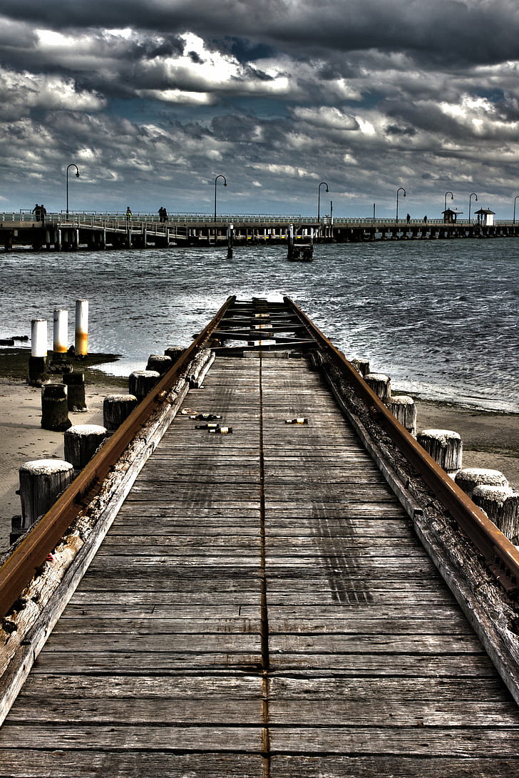 brown and gray metal framed beach bridge photo, End of the Line