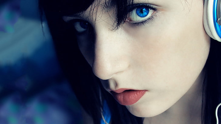 close up photo of woman's face, women, headphones, blue eyes