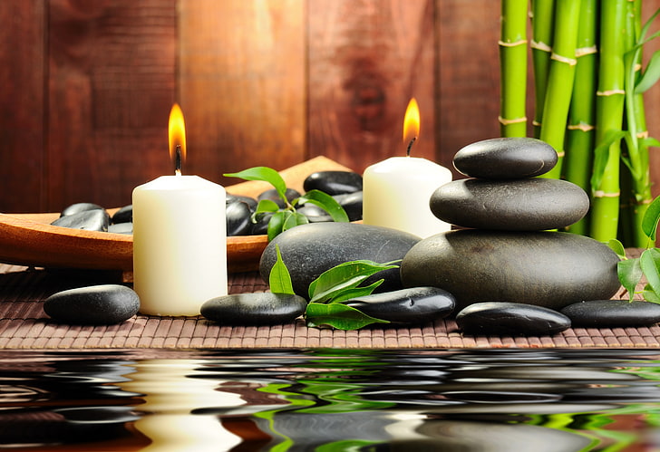 two white votive candles, water, stones, bamboo, black, Spa, massage