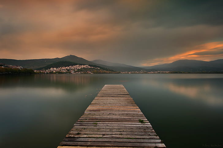 brown wooden dock bridge on lake, dark  brown, sunset, clouds