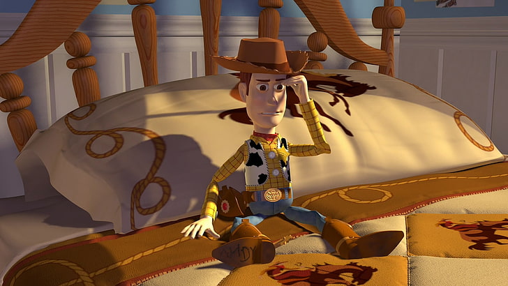 Woody from Toy Story sitting on white and brown bed, Sheriff Woody